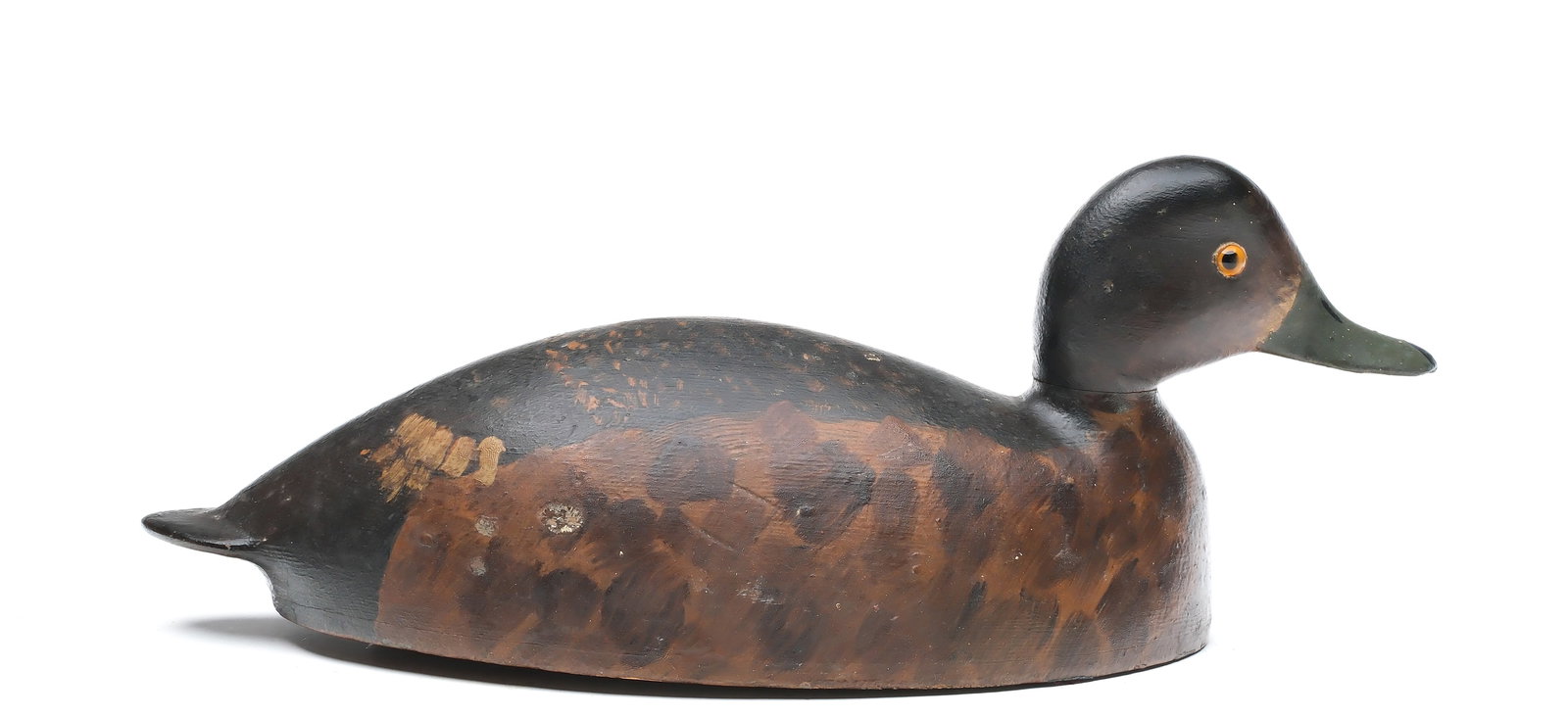 Unknown maker, Markham, Ontario, circa 1900.: Hollow carved bluebill hen. Thinly hollowed with .25" bottom board. Measures 16" long. Provenance: Dean Hyde collection