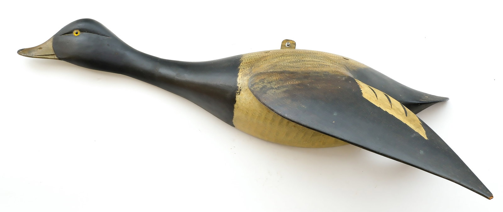 Chauncey Wheeler (1888-1937), Alexandria Bay, New York.: Full size flying bluebill. Comb feather paint detail on back. Applied outstretched wing and foot. Measures 22" long. Provenance: Dean Hyde collection.