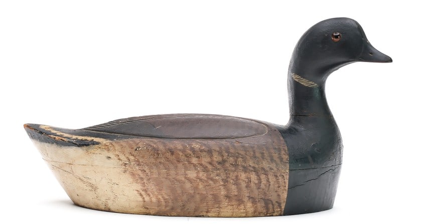 Chauncey Wheeler (1888-1937), Alexandria Bay, New York.: Brant. Two piece body with raised neck seat and slightly turned head. Relief carved "torn heart" wing pattern. "W.F.B." branded on underside. Measures 17.5" long. Provenance: Dean Hyde collection.
