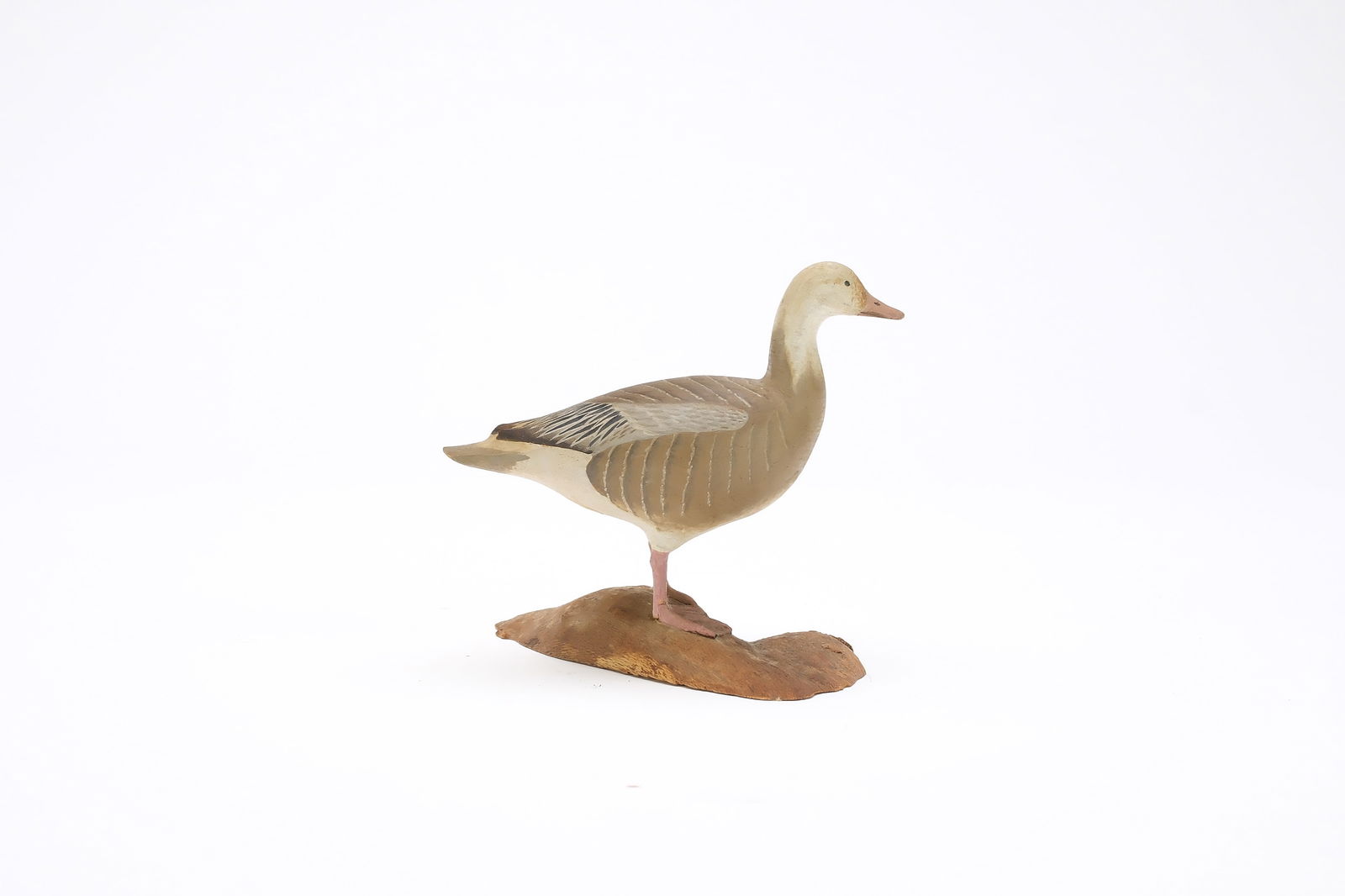 Harold Gibbs (1886-1970), Barrington, Rhode Island.: Miniature blue goose. Relief wingtip carving. Identified, initialed, and dated 1958. Measures 4" long. Provenance: Joseph Ellis collection.