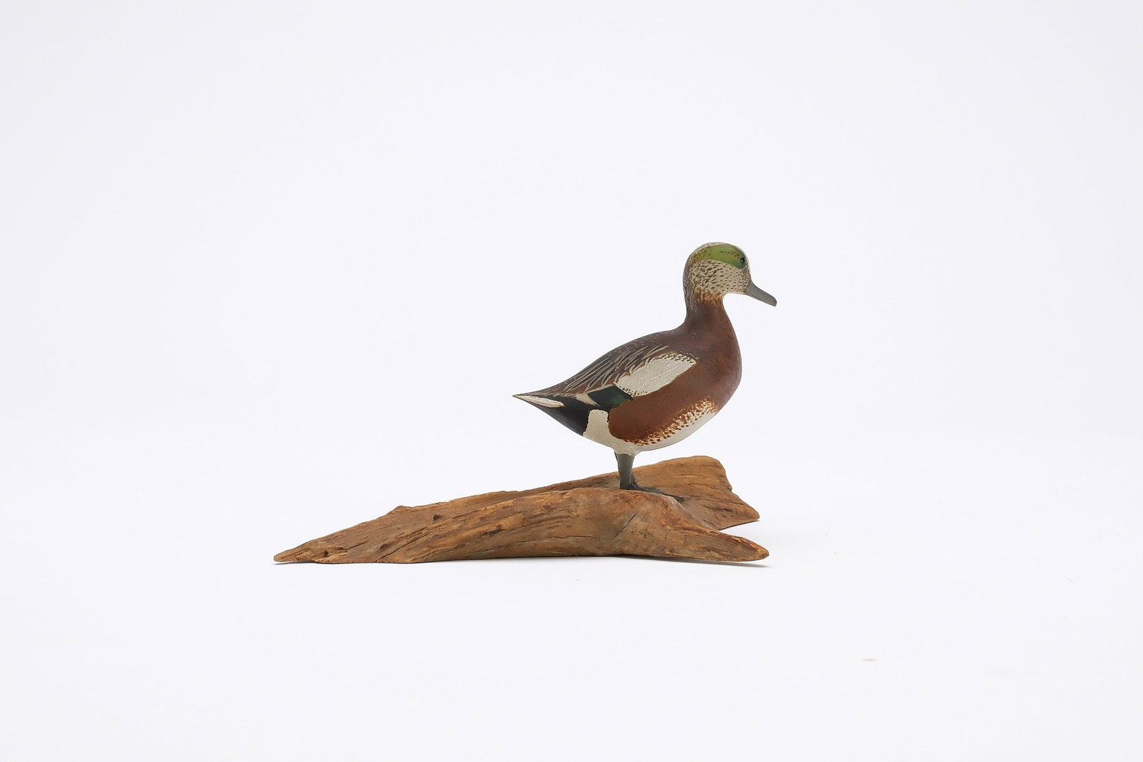 Harold Gibbs (1886-1970), Barrington, Rhode Island.: Early miniature widgeon. Identified as balpate, initialed, and dated Feb. 25, 1939. Measures 2.5" long. Provenance: Joseph Ellis collection.