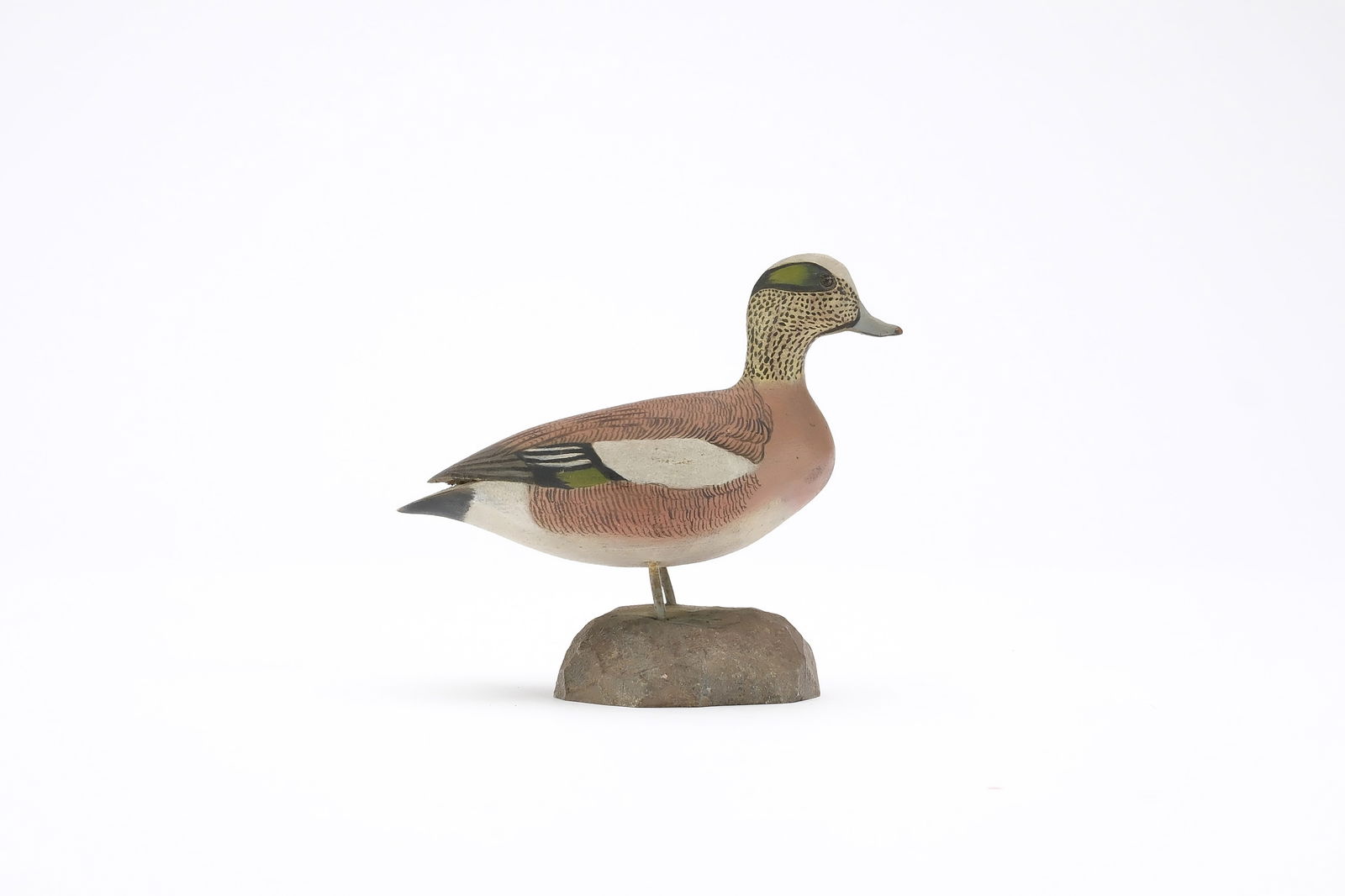 Jess Blackstone (1909-1988), Concord, New Hampshire.: Miniature baldpate or widgeon. Smooth body with relief wingtip carving. Identified, initialed, and numbered 1 on underside. Also dated 1943. Measures 4" long. Provenance: Joseph Ellis colle