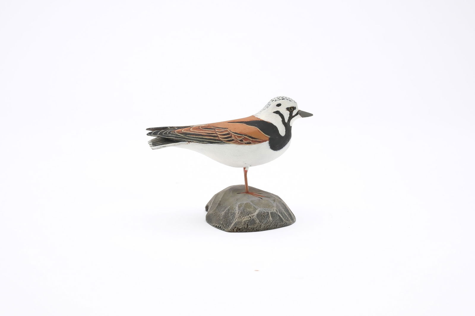 Jess Blackstone (1909-1988), Concord, New Hampshire.: Miniature turnstone. Raised wingtips and feather rasping. Identified, and numbered 36 on underside. Measures 3.75" long. Provenance: Joseph Ellis collection.
