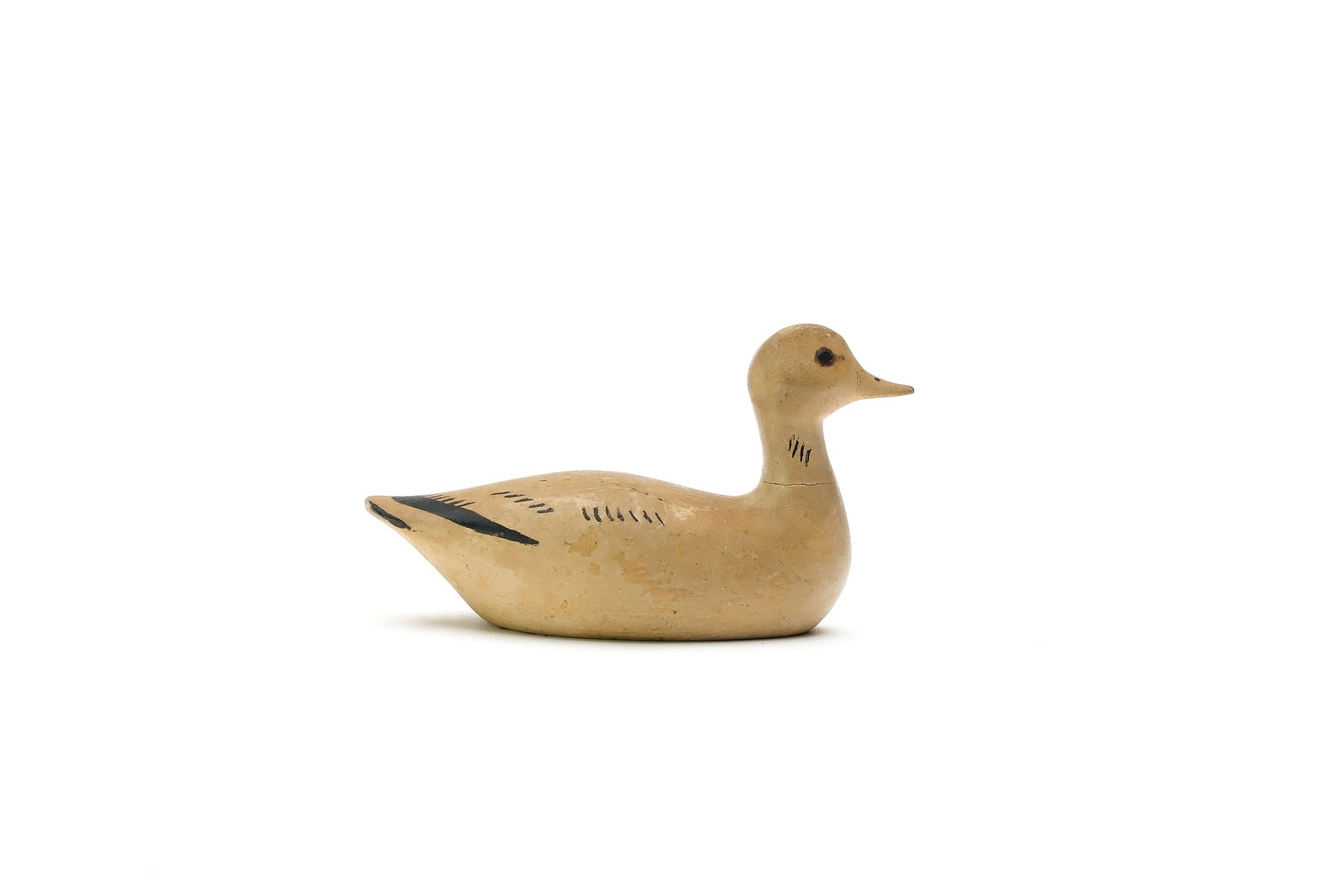 George Boyd (1873-1941), Seabrook, New Hampshire.: Miniature snow goose. Simple black and white paint pattern. Measures 4" long.