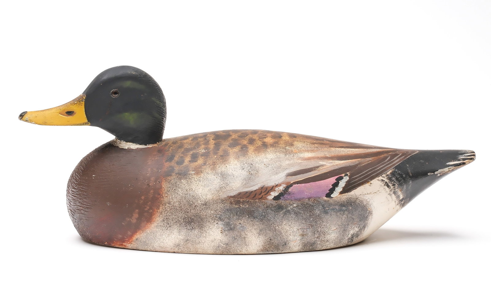 A. Elmer Crowell (1862-1952), East Harwich, Massachusetts.: Excellent mallard. Maker's oval brand on underside. Slightly turned head. Goldberger collection ink stamp on underside. Measures 17.5" long. Provenance: Chris Mackey collection.