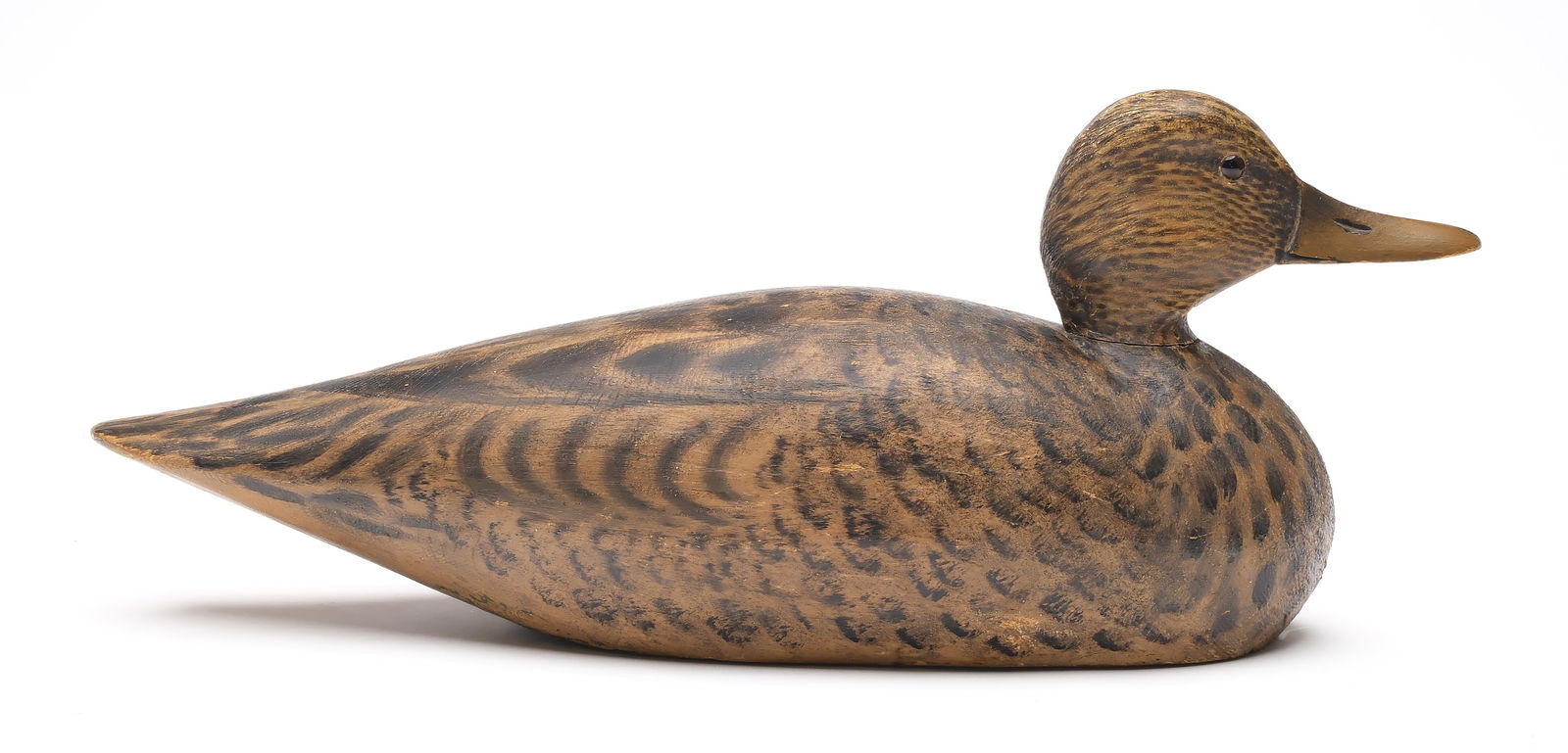 A. Elmer Crowell (1862-1952), East Harwich, Massachusetts.: Excellent and early mallard hen. Pre-brand model with upswept bill. "CM" brand in underside. Measures 17" long. Provenance: Chris Mackey collection.