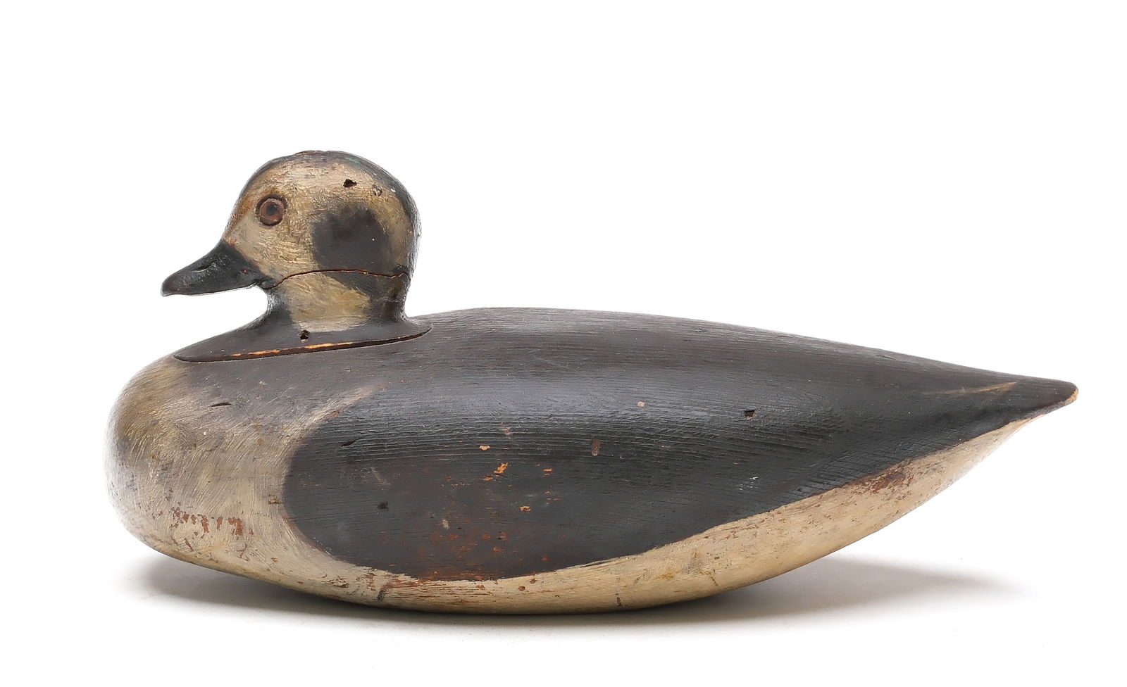 Early long-tail duck hen from New England, circa 1880.: Round inlet neck seat and carved eyes. Measures 11" long.
