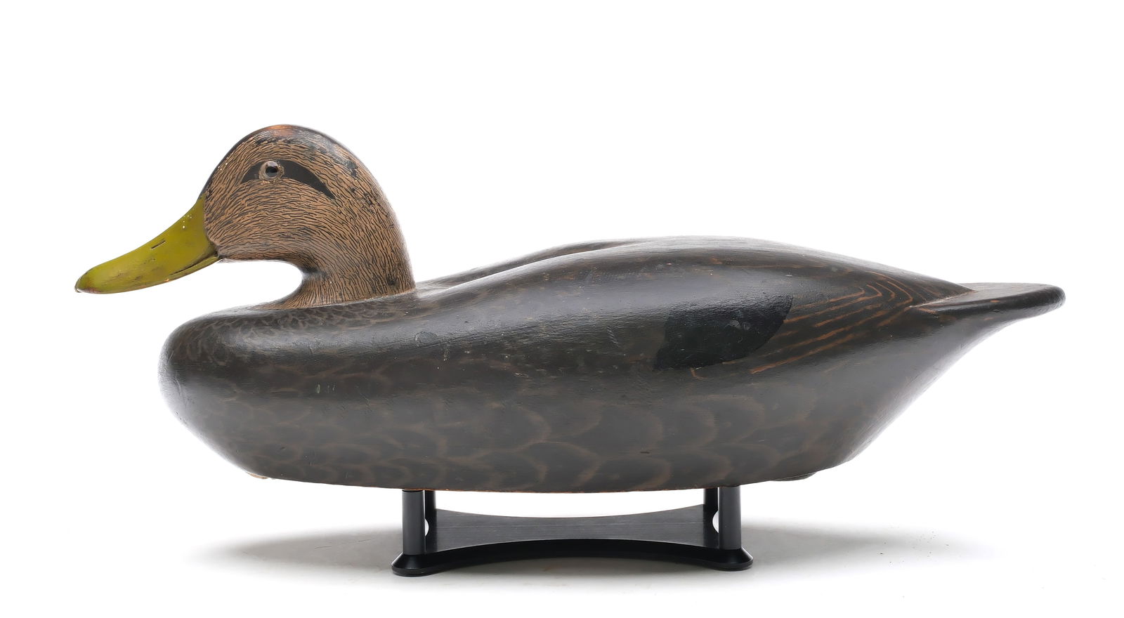 Roswell E. Bliss (1887-1967) Stratford, Connecticut.: Excellent black duck. Hollow carved with scratch feather paint detail on head. Stratford style teardrop weight. Stamped "R. Bliss". Measures 17" long. Provenance: Private Southern collection.