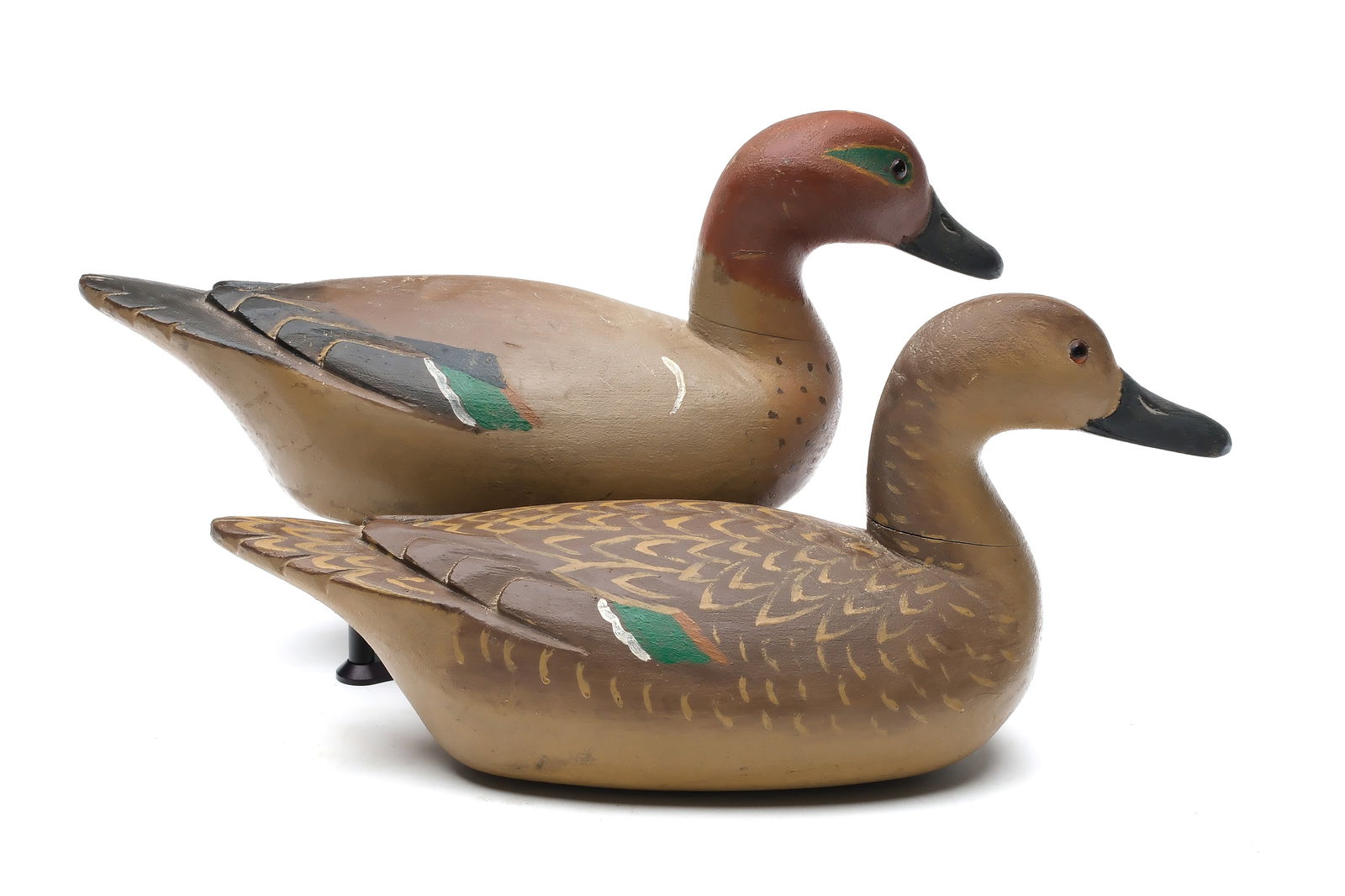 Richard Janson (1872-1951), Sonoma Creek, California.: Very rare and important pair of greenwing teal. Four deeply carved relief wing feathers. Drake's head is slightly turned. Decoys were never rigged or weighted. Measure 13.25" long. Literature: "Waterf