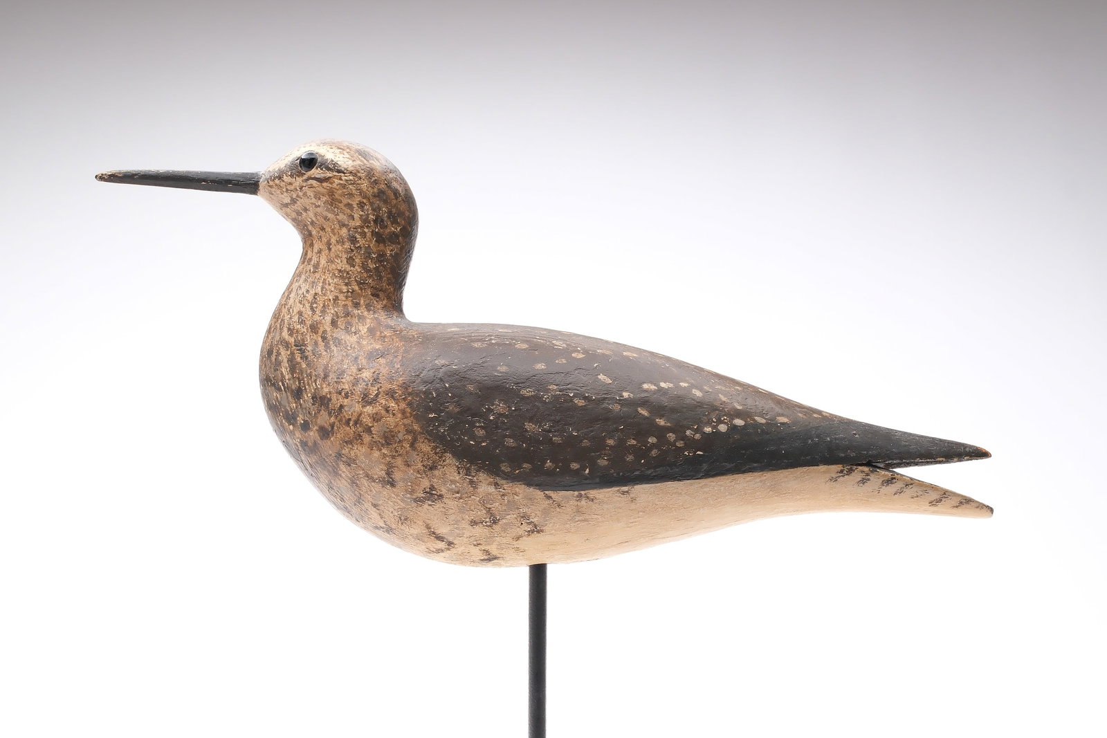 A. Elmer Crowell (1862-1952), East Harwich, Massachusetts.: Early yellowlegs from the Parker Whittimore rig. Branded "PWW" on underside. Measures 13" long. Provenance: Martin and Deborah Maloy collection.