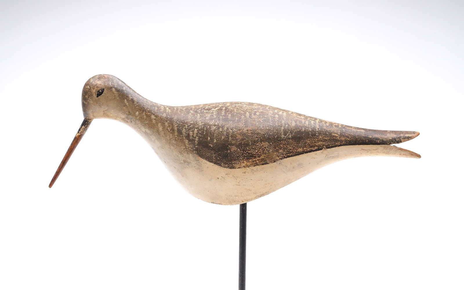 Yellowlegs wind bird" from Massachusetts, early 20th century.: Thinly hollowed from the underside. Decoy would move on its stickup stake with the slightest breeze. Measures 12.25" long.