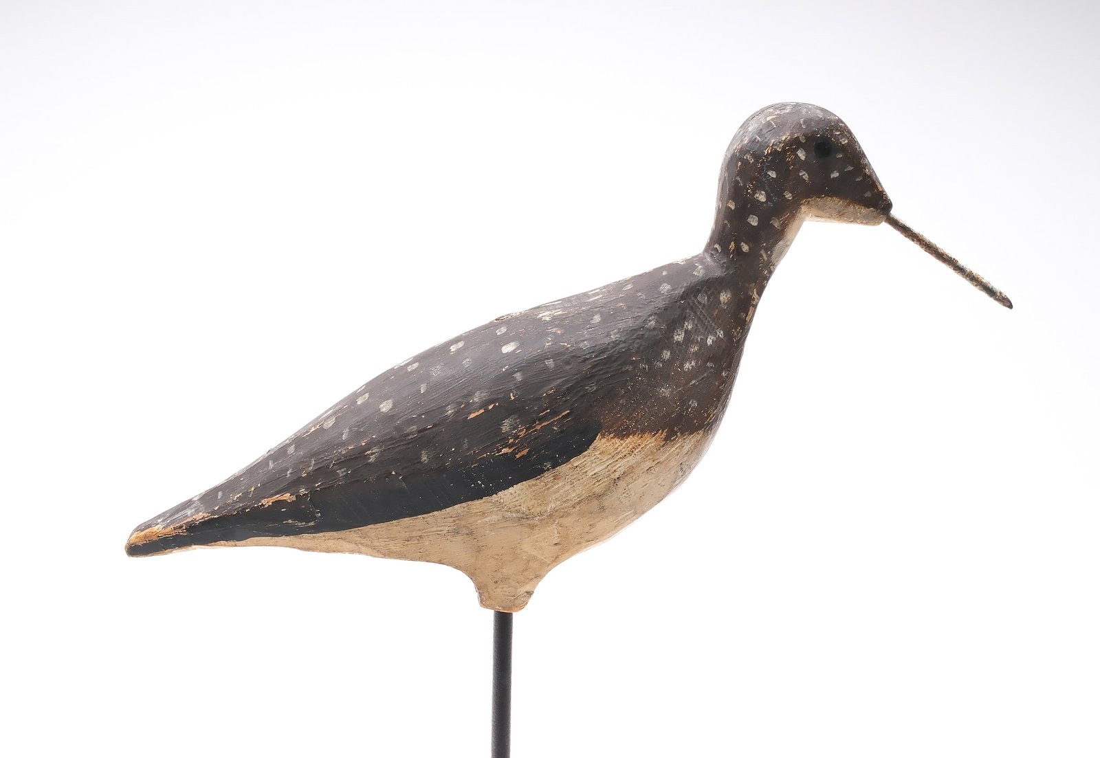 Chip carved yellowlegs, circa 1900.: Carved extended thighs and iron bill. Measures 11" long. Provenance: Private Southern collection.