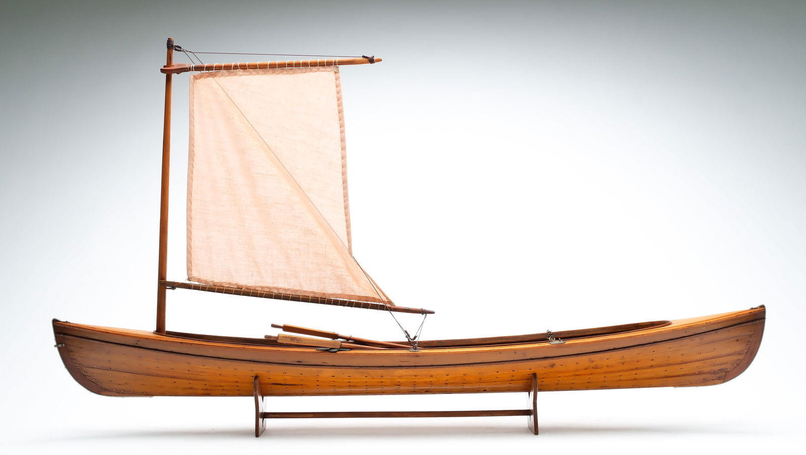 Early sailing canoe model. - 2
