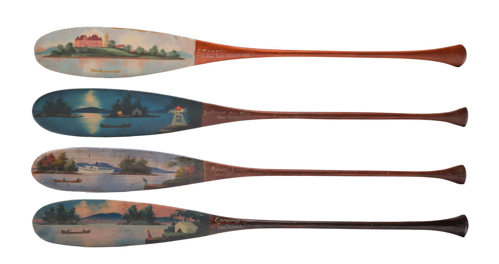 Alpheus Keech (1855-1926).: Group of four 1,000 Islands souvenir paddles. Titled Calumet, Autumn Scenery, Camping, Lighthouse and Moonlight. Measure 22" long. Provenance: Dean Hyde collection.