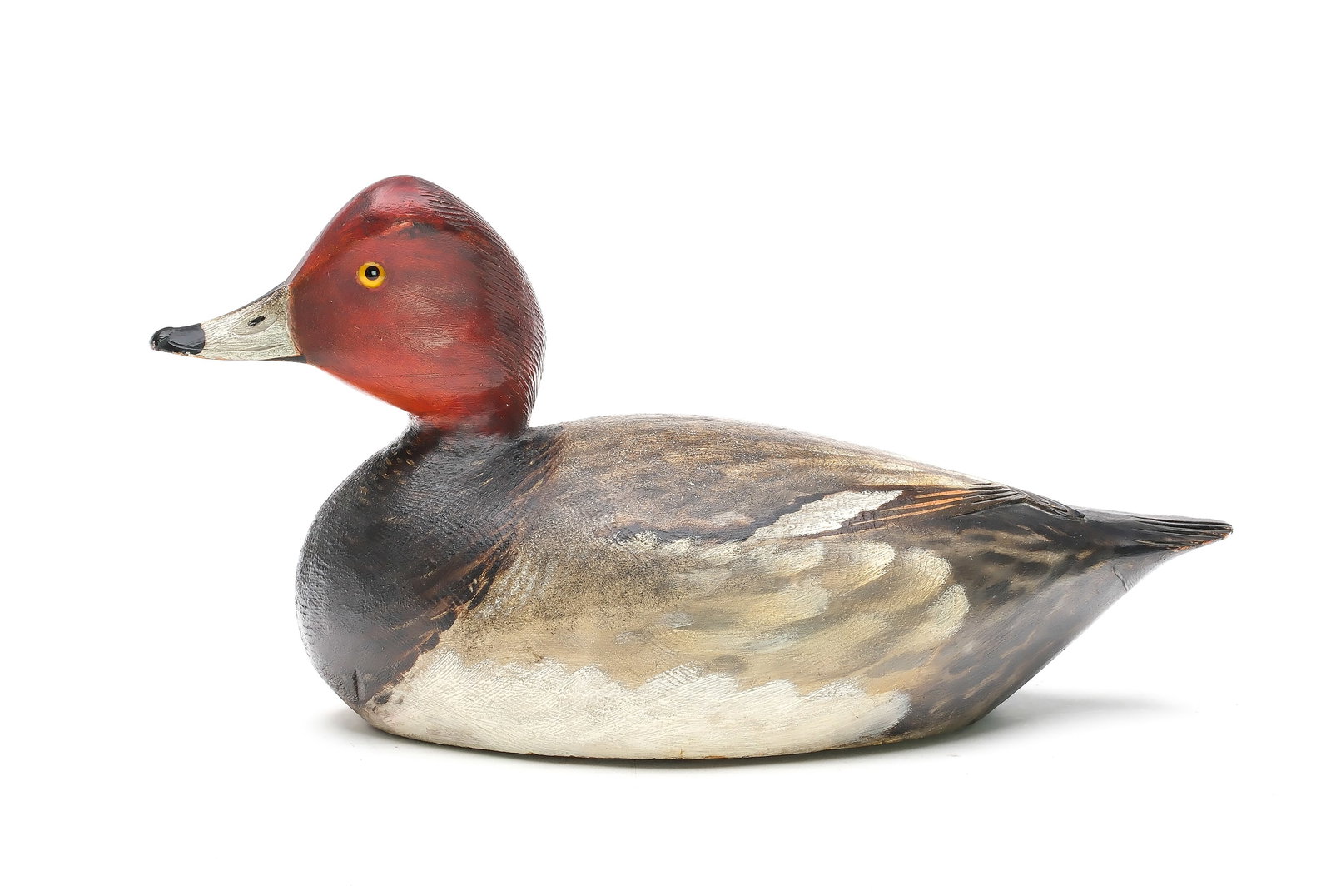 A. Elmer Crowell (1862-1952), East Harwich, Massachusetts.: Outstanding redhead. Made for Dr. John Cunningham. Slightly turned head, relief crossed wingtips, and relief tail feather carving. Oval brand in underside. Decoy was never rigged or weighted. Measures