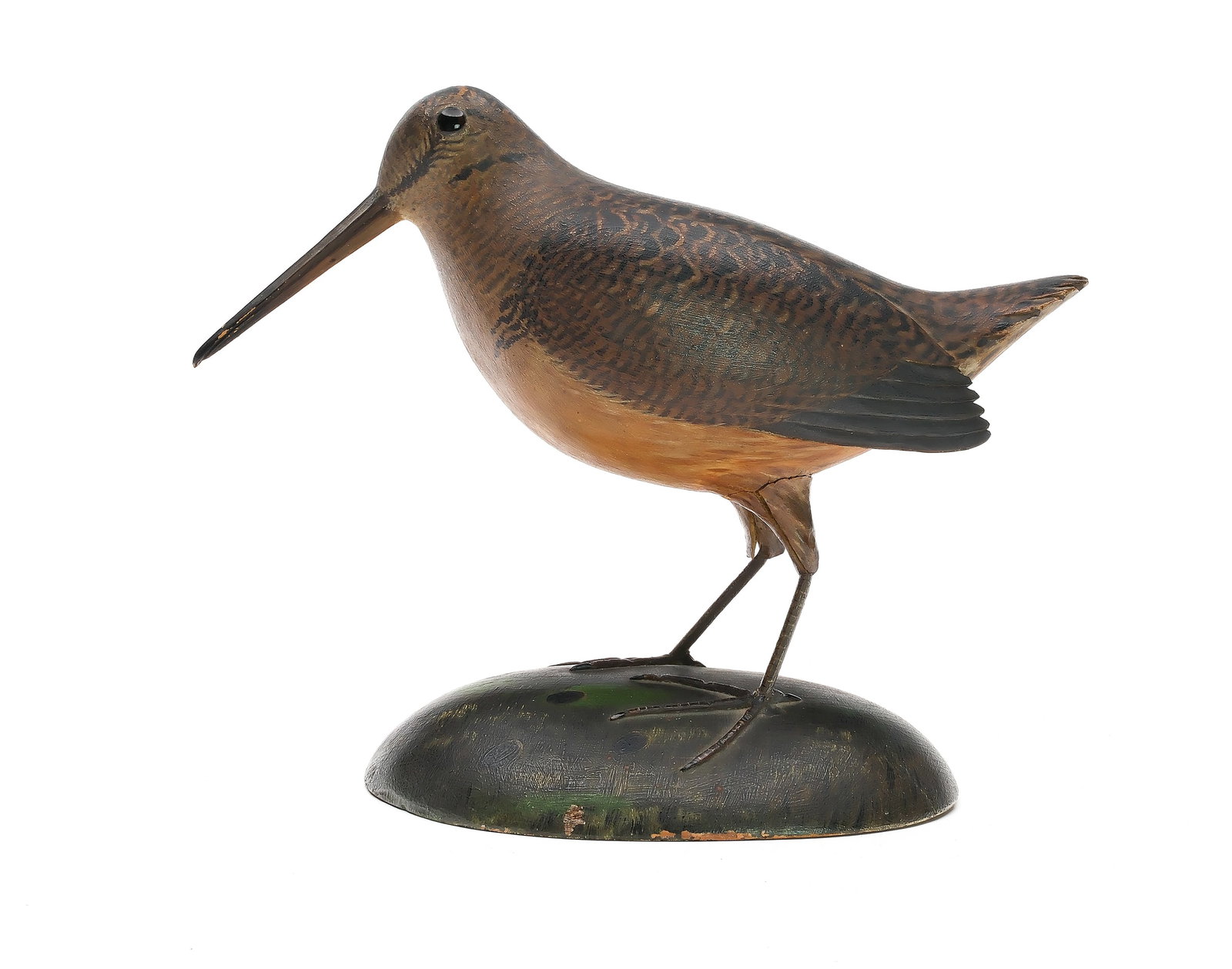 A. Elmer Crowell (1862-1952), East Harwich, Massachusetts.: Excellent decorative woodcock. Dropped wing carving with relief tail and wing feather detail. Maker’s oval brand on underside. Base is painted with holes where woodcock was digging for worms wit