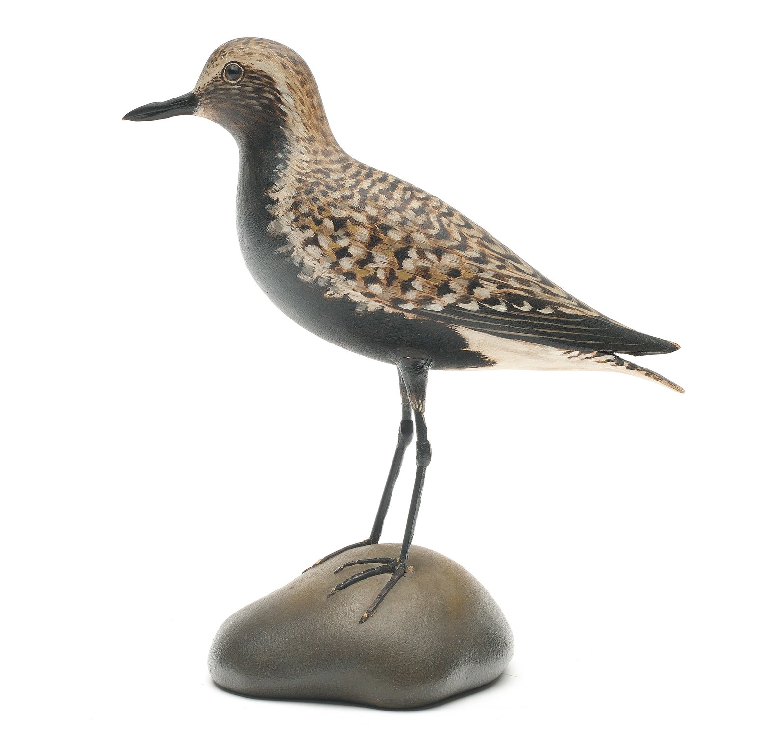 A. Elmer Crowell (1862-1952), East Harwich, Massachusetts.: Decorative plover. Slight relief wingtip carving and excellent paint detail. Maker’s blue paper label on underside. Measures 10” long. Original paint; tiny flakes at wingtips and very tip 