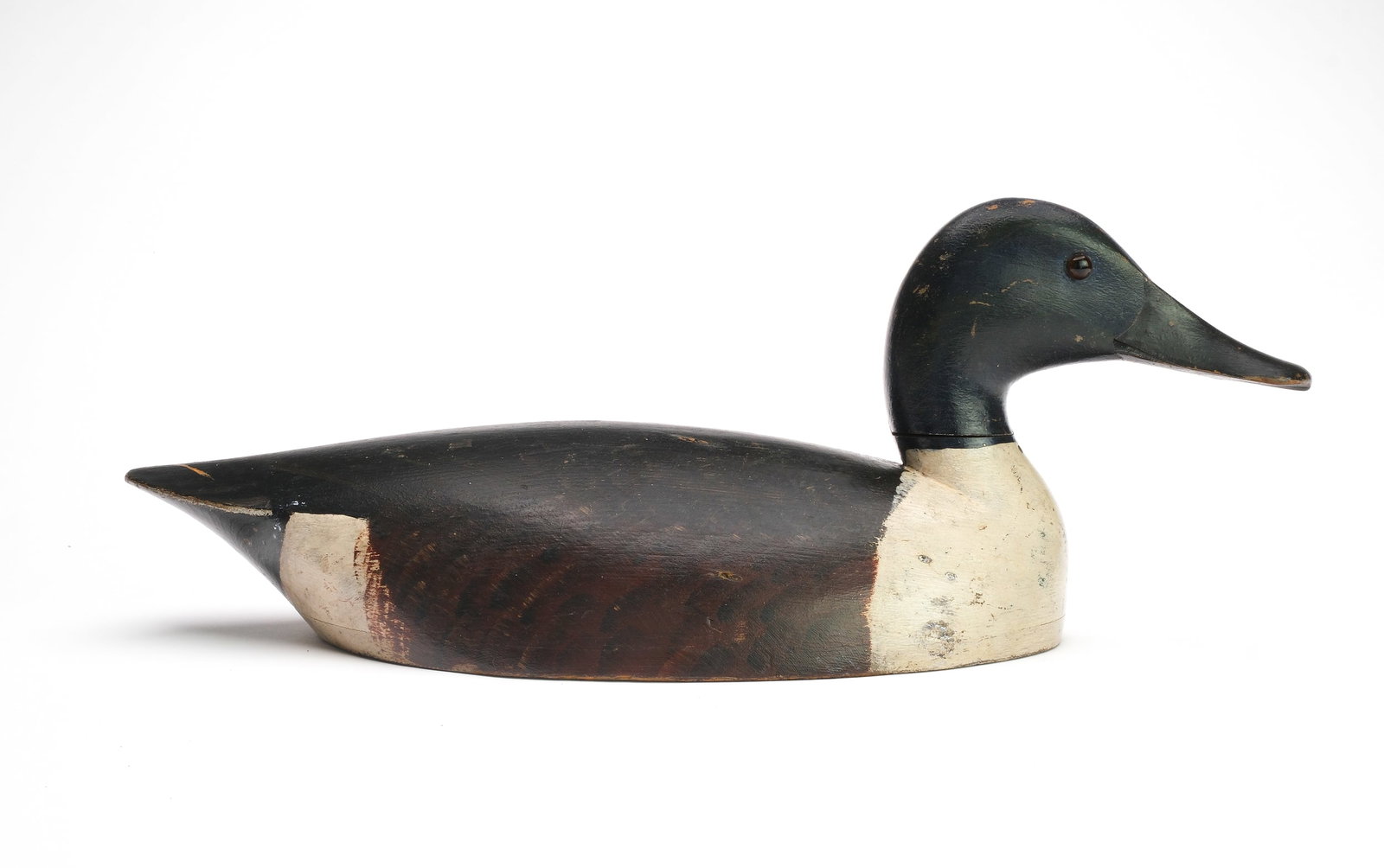 John R. Wells (1861-1953), Toronto, Ontario.: Extremely rare shoveler. Hollow carved with .25” bottom board and wide bill carving. “J.R.W. Maker” branded on underside. Also initialed “J.B.W.”. Measures 16.5” lo