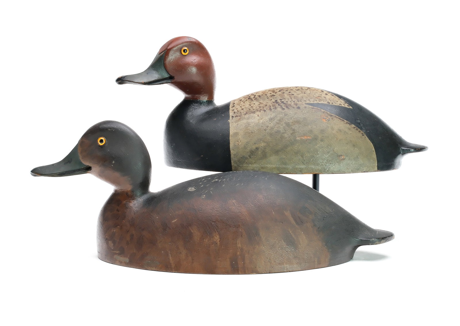Rare rigmate pair of redheads, Toronto, Ontario, circa 1900.: From the Markham rig with wide bill carving. Thinly hollowed with .25” bottom boards. Drake with slightly turned head. Decoys were never rigged or weighted. Measure 15.25” and 16” lo