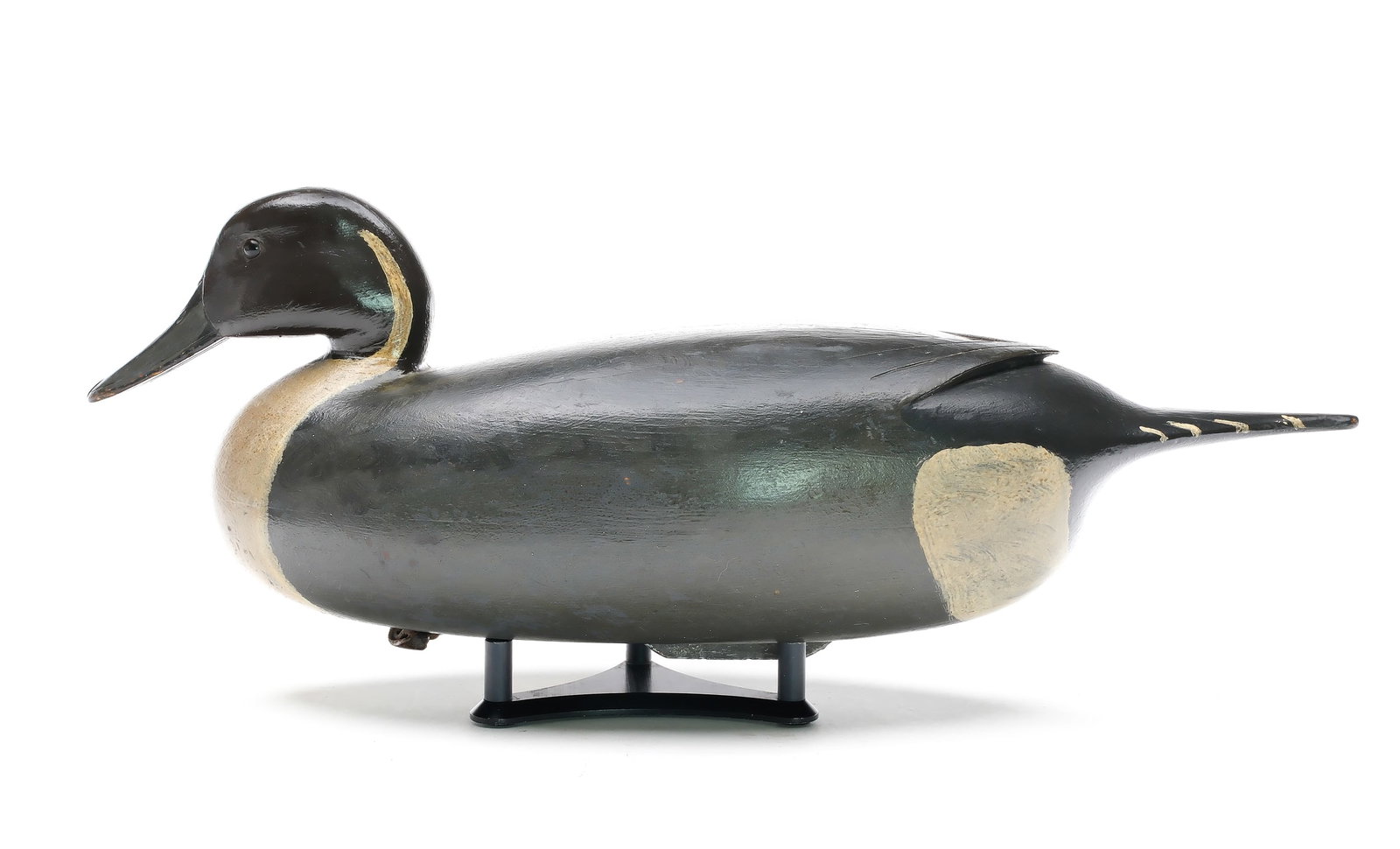 Joe King (1905-1992), Edgely, Pennsylvania.: Extremely rare pintail circa 1930’s. One of 6 made. Hollow carved with raised V wingtip carving. Maker’s name and town stamped in lead weight. Hillman collection ink stamp on underside. Me