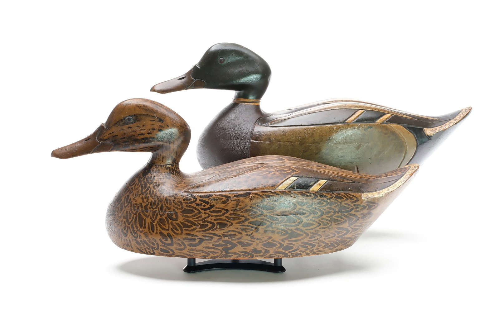 Al Ries (1899-1978), Chicago, Illinois.: Very rare pair of mallards. Hollow carved with incised wing carving. Heavily influenced by the Mason factory premier grade model decoys. Heads are doweled in and removable. Al Ries at his best. Measur