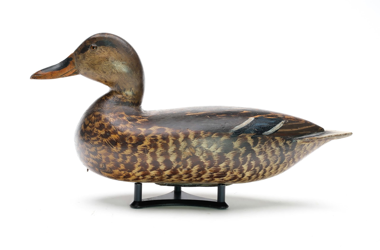 Judge Glen Cameron (1882-1958), Chillicothe, Illinois.: Excellent mallard hen. Hollow carved. Branded “G.J.C.” for rig of the maker. Measures 16” long. Provenance: Jim and Diane Cook collection. ???????