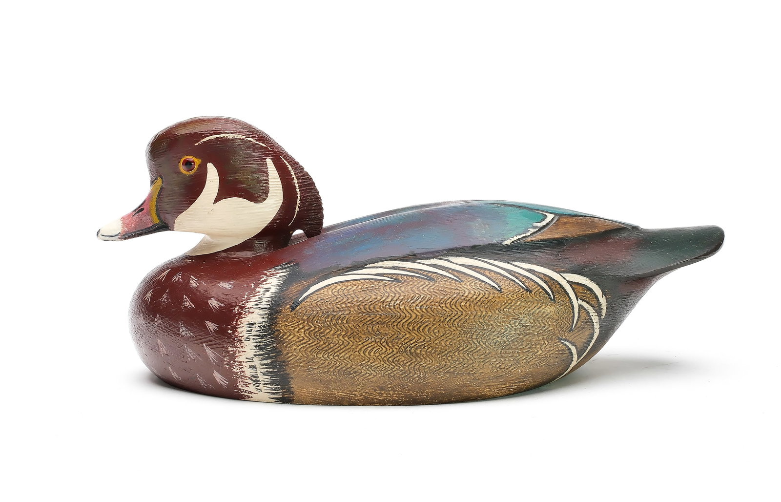 Ken Anger (1905-1961), Dunnville, Ontario.: Rare wood duck. Relief wing and incised feather carving. Extended crest and comb feather paint detail. Measures 12.75” long. Provenance: Jim and Diane Cook collection. ???????