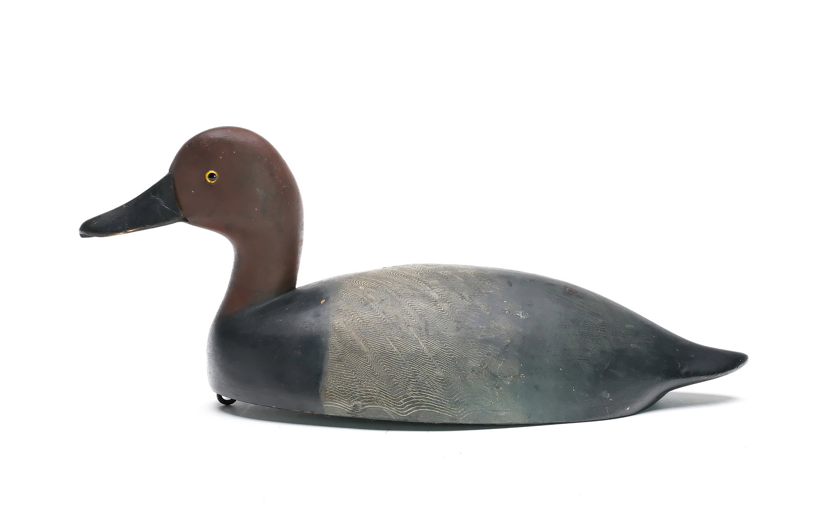 Walter Humphries, Toronto, Ontario.: Rare redhead. Very thinly hollowed with .25” bottom board and fine comb feather paint detail. Measures 16.5” long. Provenance: Jim and Diane Cook collection.