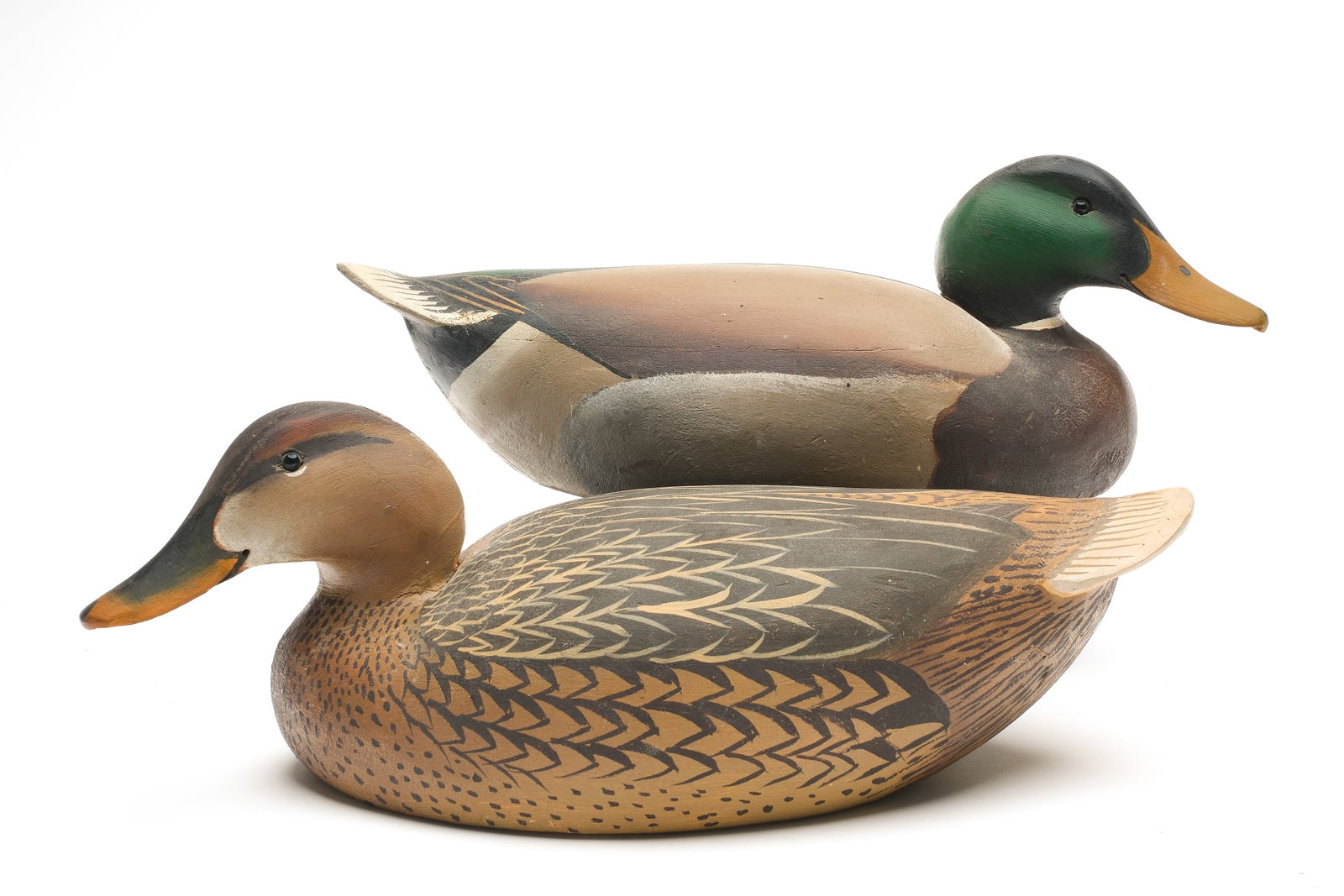 Ward Brothers, Crisfield, Maryland.: Pair of mallards. 1948 style with slightly turned heads and balsa bodies. Signed and dated 1948. Measures 16.5" long. Provenance: Frederick Raymon collection.