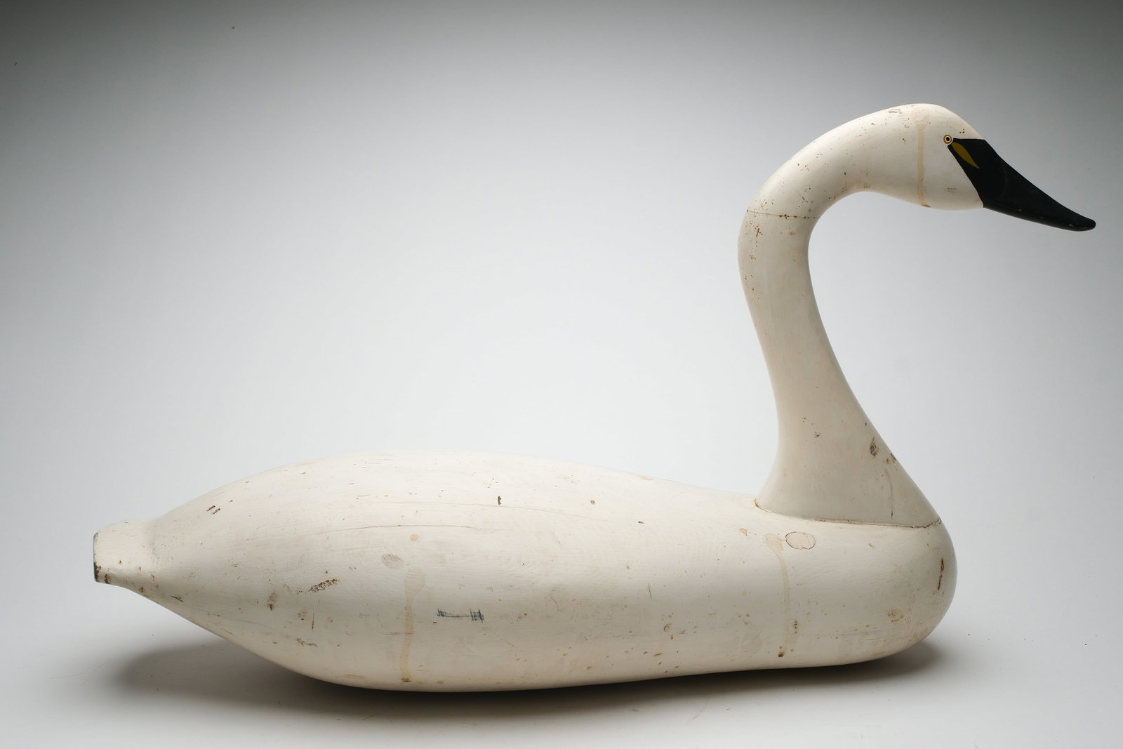 Charlie Joiner (1921-2015), Chestertown, Maryland.: Extremely rare early swan. Narrow breast and wide body. Signed and dated 1955 at a later date. Measures 33.5" long. Provenance: Oliver Smith collection.