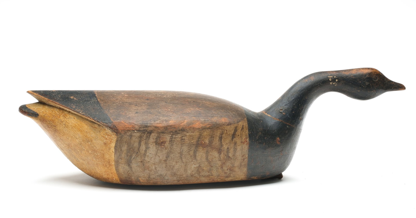 Cameron McIntyre (b.1968), New Church, Virginia.: Swimming brant. Hollow carved with relief wingtip carving. Swimming pose with carved eyes. "CTM" carved in underside. Measures 25" long.