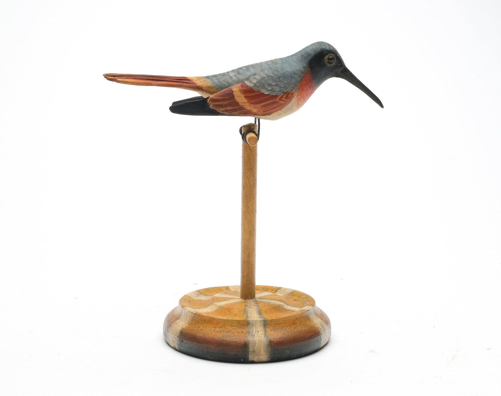 Frank Finney (b.1947), Cape Charles, Virginia.: Hummingbird. Outstretched, dropped wings and relief tail feather carving. Maker's ink stamp on underside. Measures 7" long, piece stands 7.75" tall.