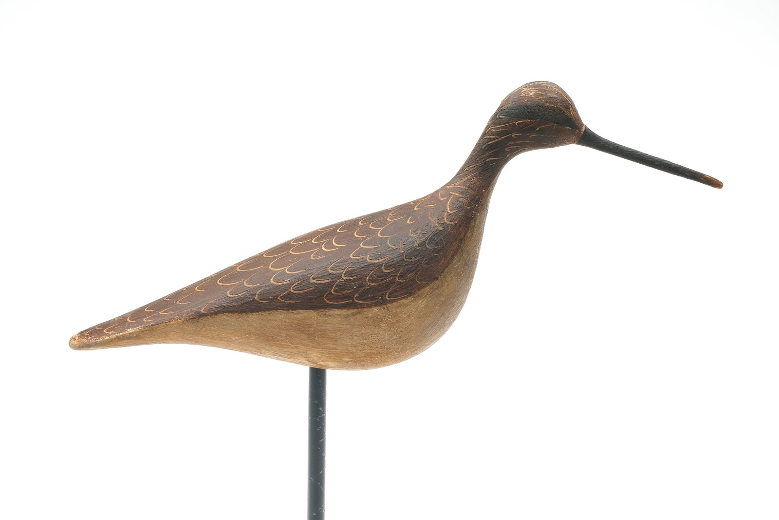 Mark McNair (b.1950), Craddockville, Virginia.: Yellowlegs. Carved in the style of Ira Hudson, with scratch feather paint detail. "McNair" carved in underside. Measures 11.5" long.