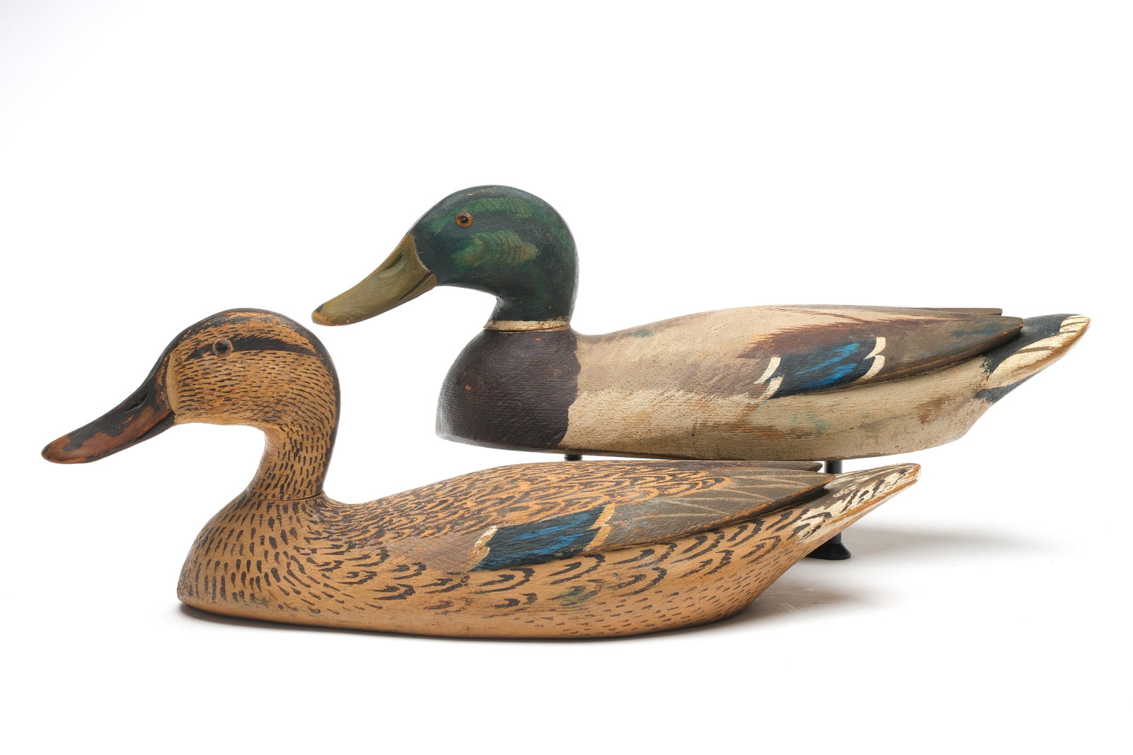Horace "Hi" Crandall (1892-1969), Westwood, California.: Rigmate pair of mallards. Relief wingtip carving and slightly turned heads. Measure 15.25" and 15.75" long.