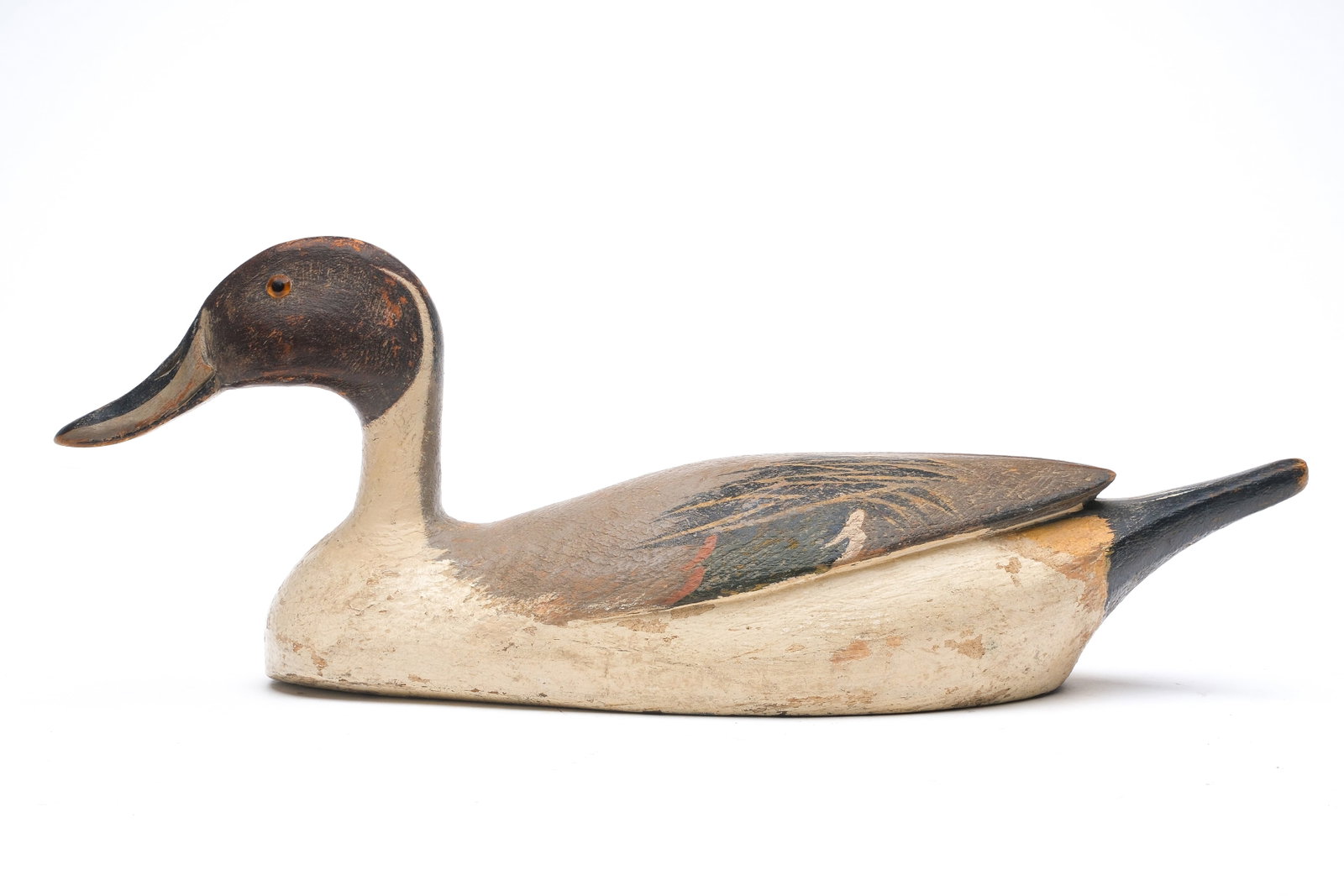 Horace "Hi" Crandall (1892-1969), Westwood, California.: Pintail. Relief wing carving with raised wingtips. Chamfered lower edge of body. typical of the maker. Measures 16.5" long.