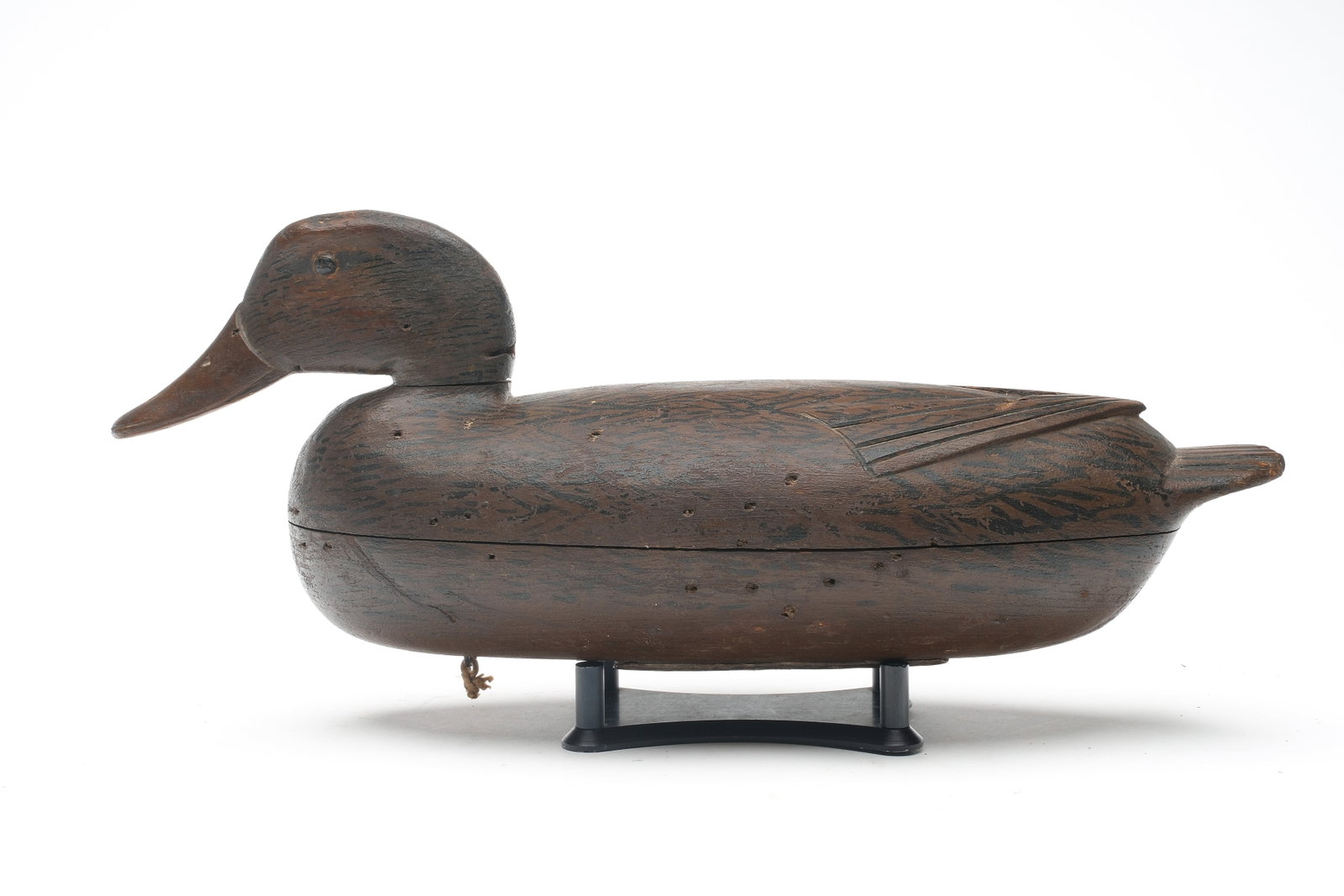 John English (1848-1915), Florence, New Jersey.: Rare mallard hen. Hollow carved with raised V wingtip carving. "DSC" stamped in underside for the Dave Campbell collection. Measures 16" long.