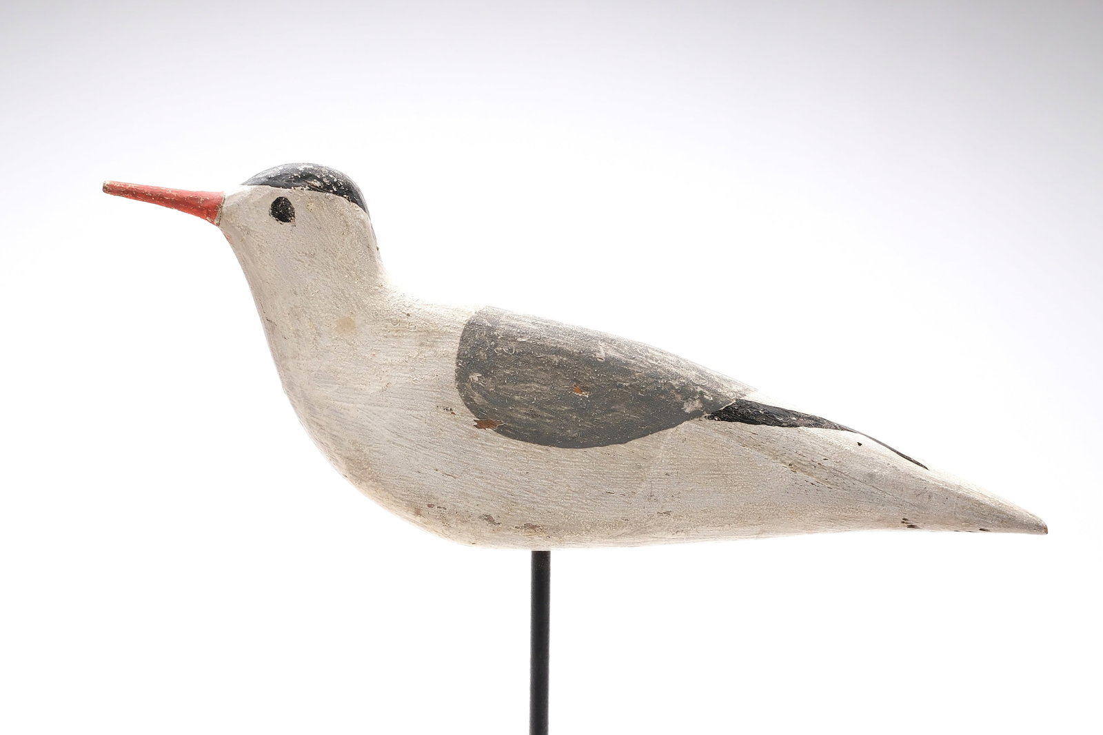 Tern from Long Island, New York, circa 1900.: Flat sided with split tail carving. Measures 12.5" long.