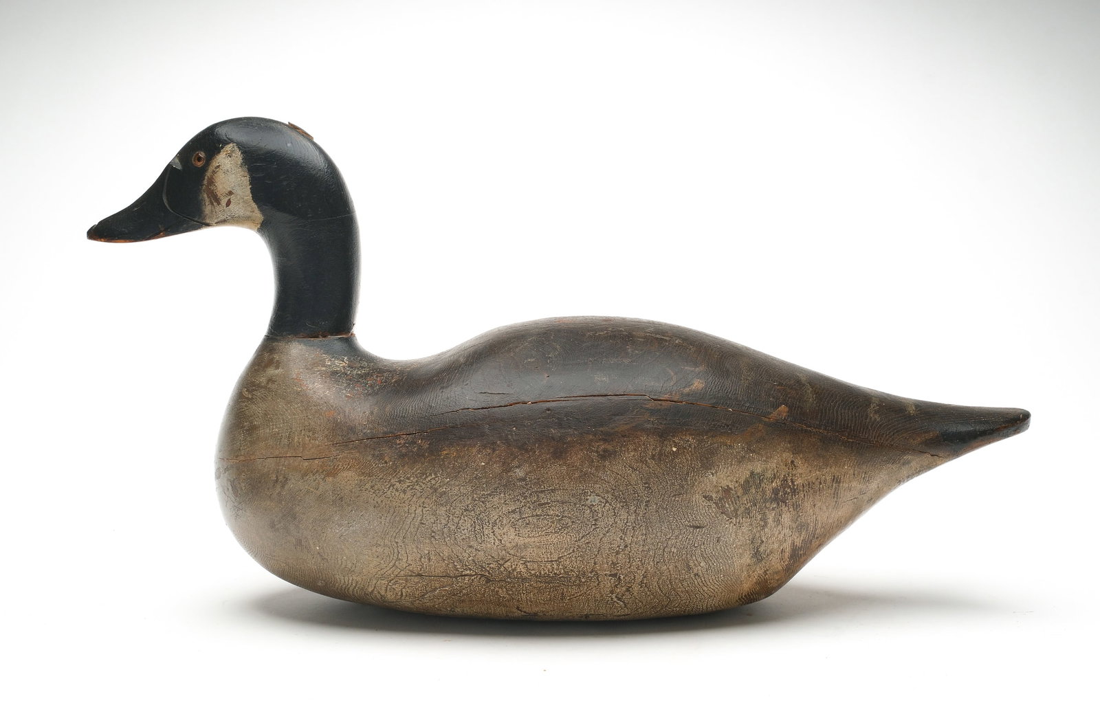 Mason Decoy Factory (1889-1924), Detroit, Michigan.: Canada goose. Premier grade model. Measures 25" long. Provenance: Chris Mackey collection.