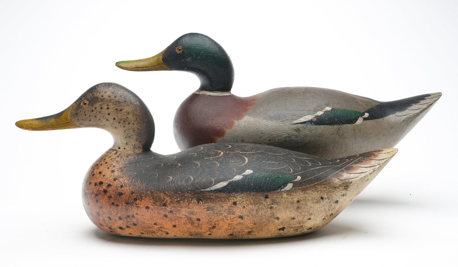 Mason Decoy Factory (1889-1924), Detroit, Michigan.: Rigmate pair of mallards. Challenge grade with snakey head style. Measure 17" long. Provenance: Chris Mackey collection.