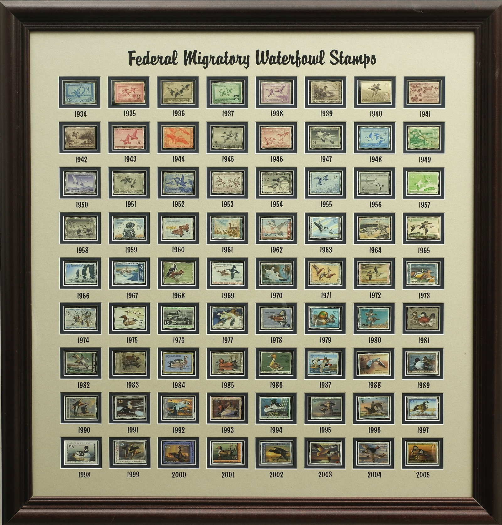 A set of federal migratory game stamps.: Featuring 1934-2025. Framed in two individual frames. Most stamps are unsigned. Only one stamp appears to have been signed 1937. Largest frame measures 33.5" x 32". Other measures 18" x 22"