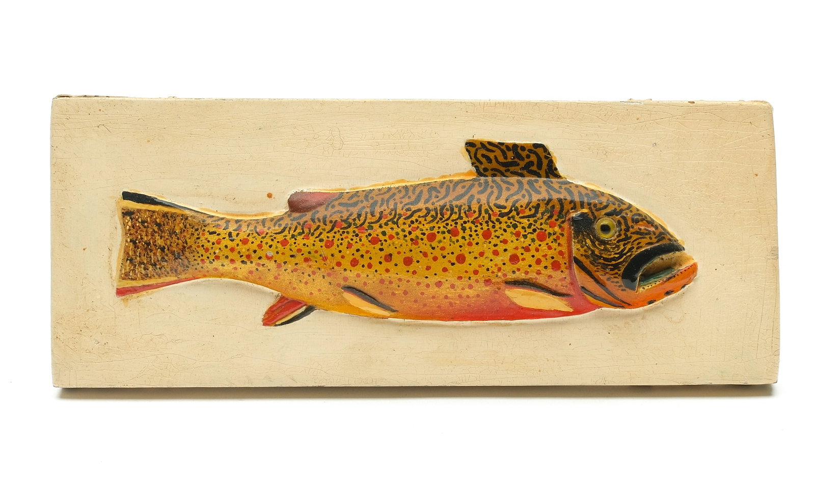 Oscar Peterson (1887-1951), Cadillac, Michigan.: Relief carved brook trout. Glass eye, metal strapping on back and sides. Written in pencil "Made by Oscar Peterson 223 Cadillac, Michigan, brook trout." Plaque measures 2 3/4" x 6 3/4" x 1/2". P