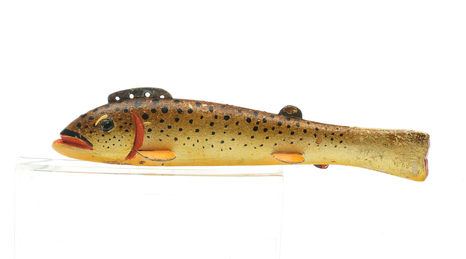 Oscar Peterson (1887-1951), Cadillac, Michigan.: Trout fish decoy. 2nd quarter 20th century. Brown trout with tack eyes. Measures 7" long x 3/4" wide x 1 1/8" tall.