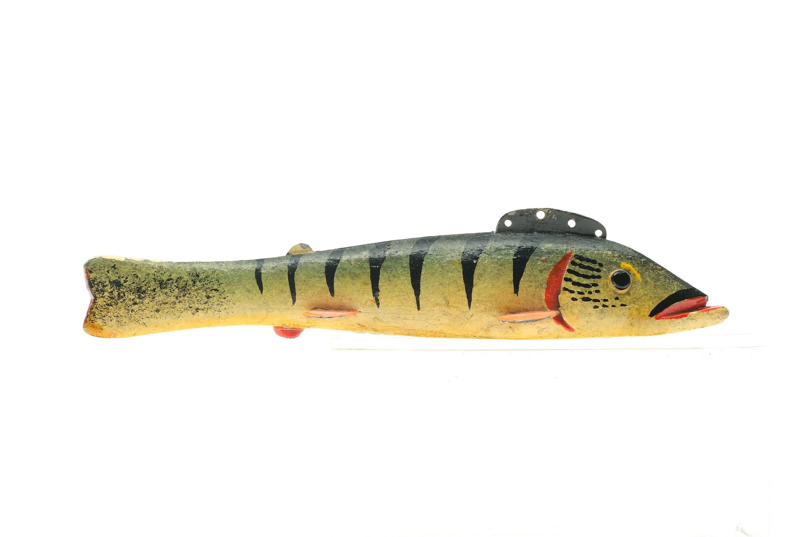 Oscar Peterson (1887-1951), Cadillac, Michigan.: 2nd quarter 20th century. Perch fish decoy. With tack eyes. Measures 7" x 3/4" x 1 1/8".