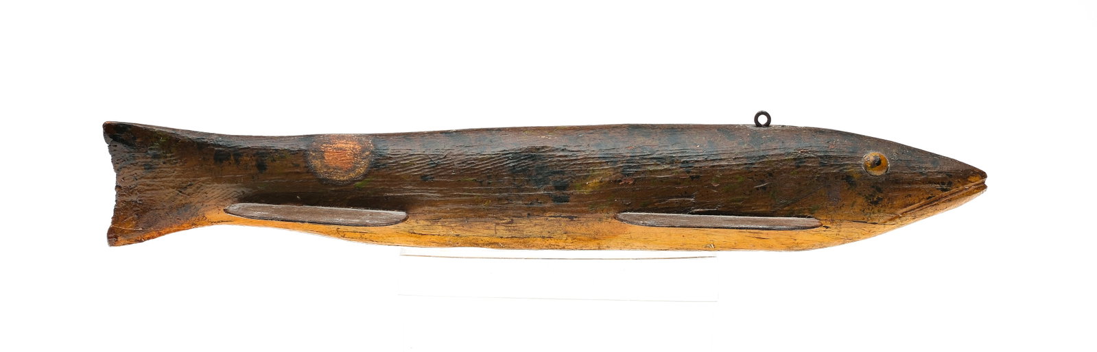 Frank Kuss (1871-1950), Mt. Clemens, Michigan.: Fish decoy, 1st quater 20th century. Bass with tack eyes, carved mouth, and metal fins. 13" long. Provenance: Private Michigan collection.