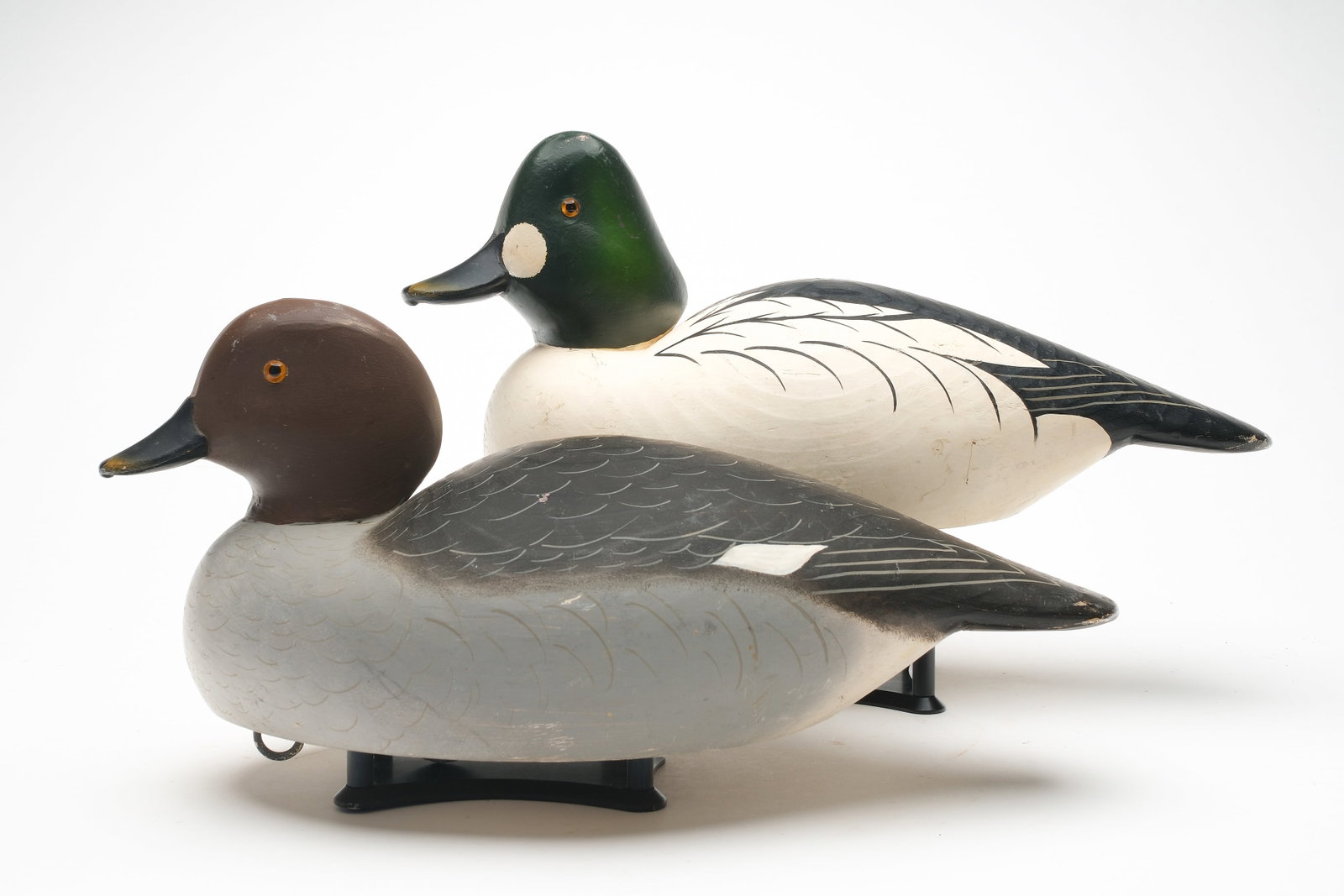 Charlie Joiner (1921-2015), Chestertown, Maryland.: Pair of goldeneye. Flat bottom style with slightly turned heads. Signed and dated 1967. Measure 15" long.