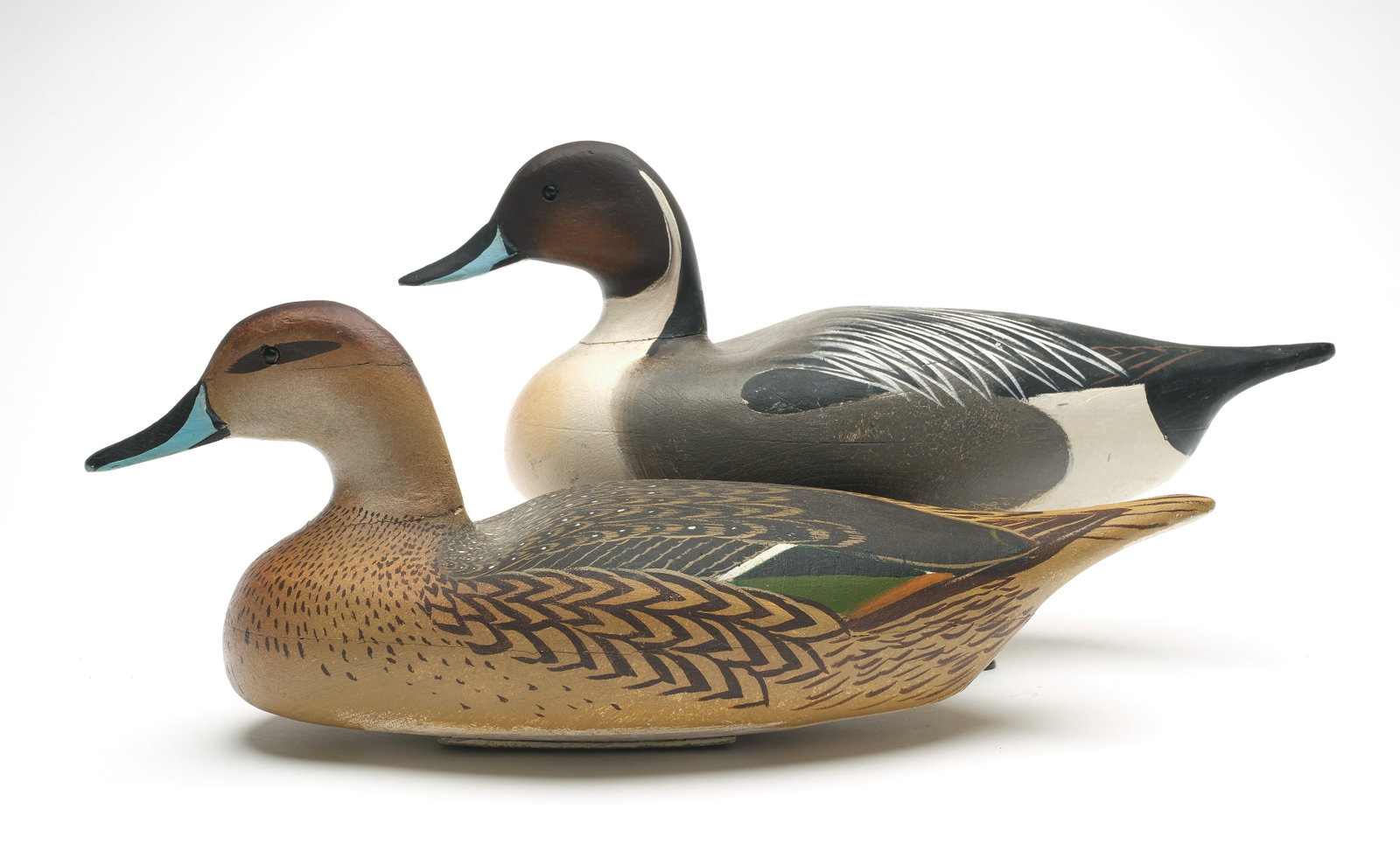 Clark Madera (1883-1953), Pitman, New Jersey.: Rigmate pair of pintails. Hollow carved. Measure 16.75" long.