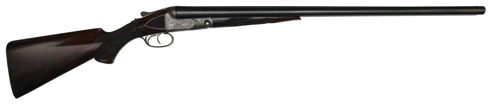 FINE PARKER AHE GRADE 12 BORE GAME GUN WITH SUPERIOR ENGRAVING.: SN. 129689. Cal. 12ga. Built on a No. 2 frame with 28" Acme steel brls that have matted concave top rib with brass front bead. Brl flats stamped "A", "6", and have 3lbs. 15oz. unstruck weight. Walnut 