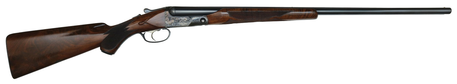 CHOICE AND WELL DOCUMENTED PARKER DHE 20 BORE SHOTGUN WITH CASE AND PROVENANCE.: SN. 235317. Cal. 20ga. Built on a 0 frame with 28" Titanic brls that have matted concave top rib with twin white beads. Brl flats with 3lbs. 3oz. unstruck weight. Beavertail forend checkered in point 