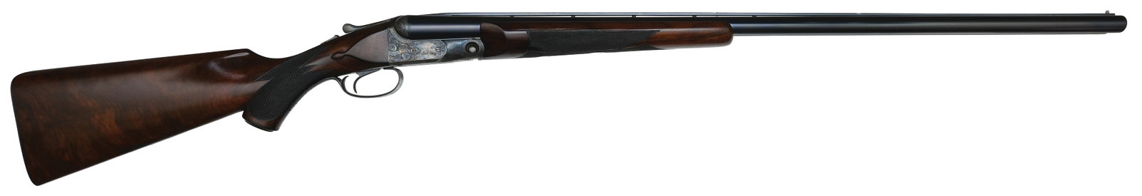 BEAUTIFUL AND RARE PARKER DHE GRADE FULLY OPTIONED DOUBLE TRAP 12 BORE.: SN. 220102. Cal. 12ga. Built on a 1-1/2 frame with 32" factory original ventilated rib brls that have white mid and brass front beads. Breech ends of brls with small ring of engraving. Brl flats with 