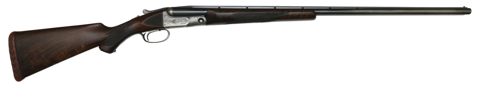 RARE PARKER GHE GRADE 20 BORE SHOTGUN WITH VENTILATED RIB.: SN. 228970. Cal. 20ga. Built on a 0 frame with 30" factory original ventilated rib brls that have twin white beads. Brl flats with unstruck weight of 3lbs. 8oz. Walnut beavertail forend is point patte